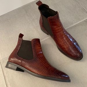 Brown Leather short boots by “Walking”.